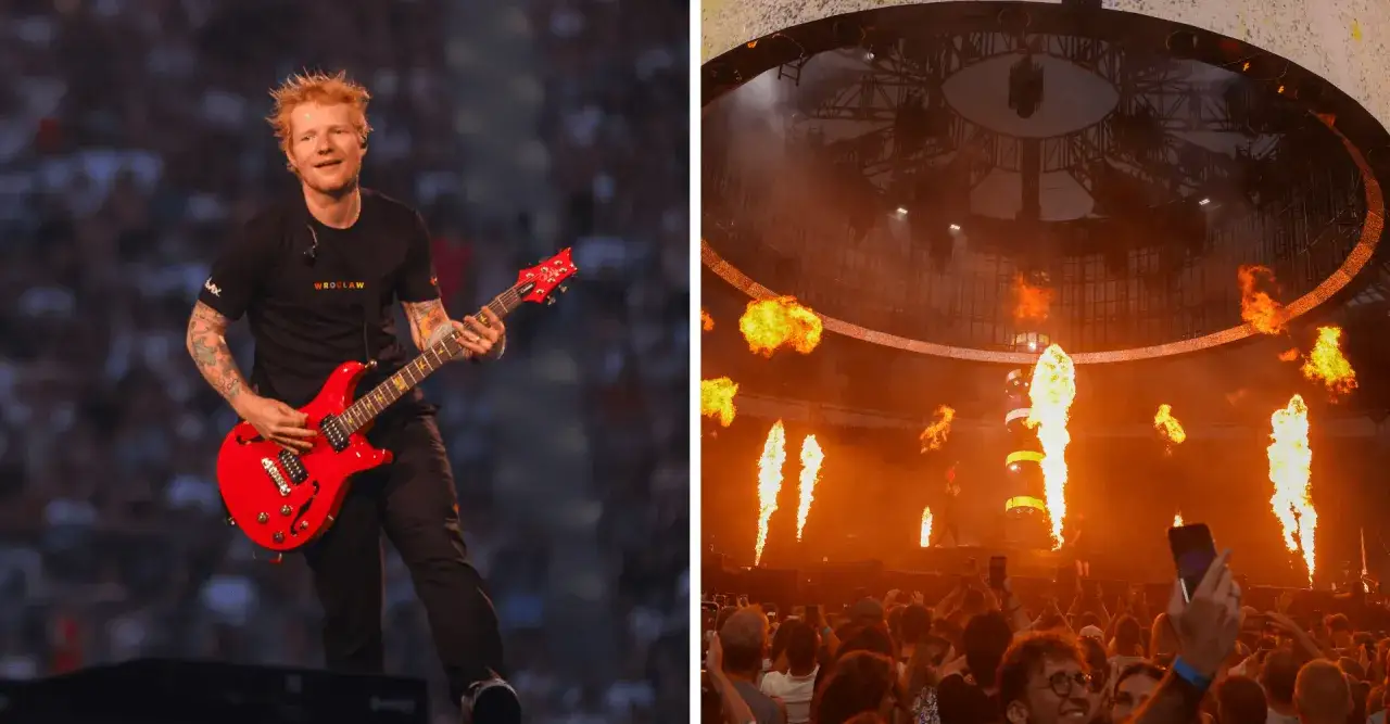 Ed Sheeran gra na czerwonej gitarze podczas koncertu, a na scenie wybuchają płomienie. Fani w tłumie nagrywają występ, pewnie myśląc o trasie Ed Sheeran 2025.