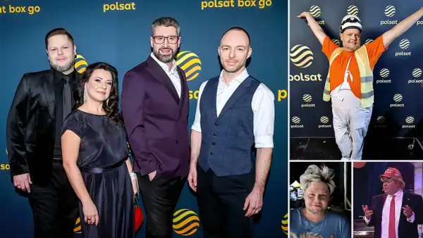 Grupa osób pozuje do zdjęć na tle niebieskiej ścianki z logo Polsat Box Go.